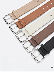 Detailed view of five color options for women's PU leather belts with silver buckles