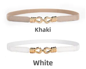 Detail of adjustable khaki and white elastic waist belts with gold interlocking buckles