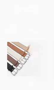 Detailed close-up of multiple PU leather belts with silver metal buckles in five colors