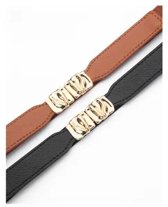 Detail of elegant women's waist belt set with gold alloy buckles and wave pattern texture