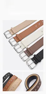 Detail of five multi-color PU leather belts featuring silver metal rivet decorations