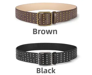 Detail of coffee and black punk belts with double rows of metal studs and square buckles