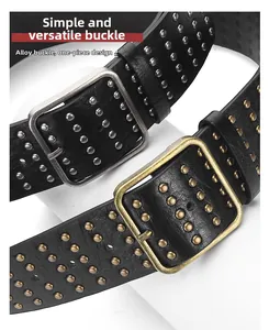 Detail of punk leather belt with metal studs and solid alloy buckle in macro view