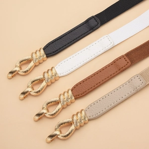 Set of four adjustable elastic waist belts in assorted colors with gold interlocking buckles