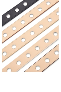 Detailed view of punk style skinny belts with silver metal eyelets in black and beige