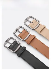 Detail of matte silver zinc alloy D-ring buckles and stitched leather belts in three colors
