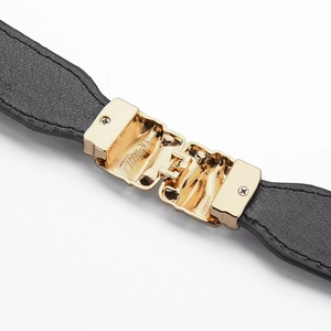 Black pebbled leather waist belt with polished gold buckle and interlocking mechanism
