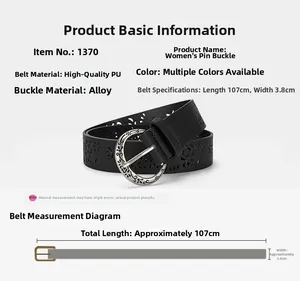 Detailed view of vintage hollow-out PU leather belt with engraved silver alloy buckle