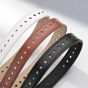 Set of three fashion belts in white, brown, and black with star-shaped hole cutouts