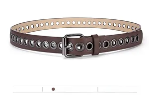 Macro detail of coffee brown faux leather belt with metal eyelets and a square buckle