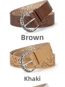 Detailed view of hollowed-out faux leather belts in coffee and khaki with floral buckles