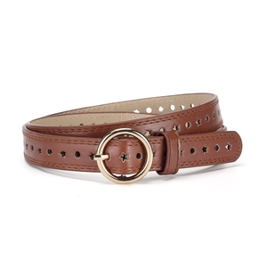 Brown leather kids belt with star cutouts and golden circular buckle on white background
