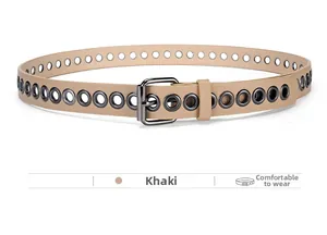 Detail view of khaki punk style thin belt with metal eyelets and black square buckle