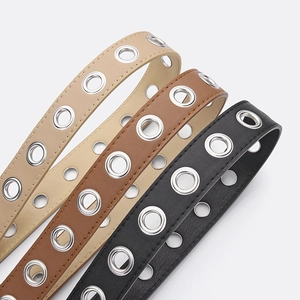 Punk style faux leather belts with silver metal eyelets in black, brown and khaki colors