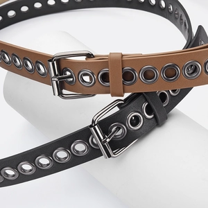 Women's slim leather belts in black and brown with punk style metal eyelets and pin buckle