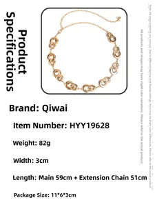 Detail view of adjustable gold metal chain belt with polished interlocking round rings