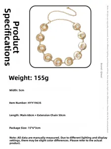 Detailed view of metal disc belt with pearls, 5cm width and adjustable long chain