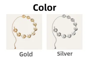 Detailed comparison of gold and silver waist chains with metal discs and inlaid pearls