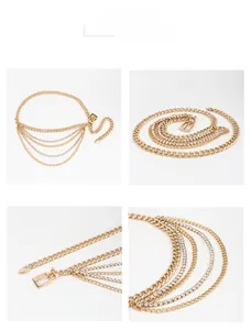Detail of layered gold metal waist chain featuring rhinestones and a square buckle clasp