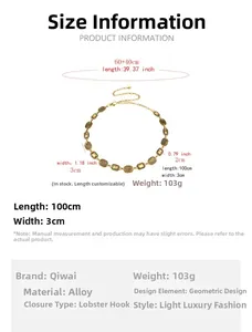 Detailed view of 100cm gold metal waist chain with amber links and lobster clasp closure