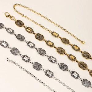 Vintage metal chain belt set in antique gold and silver with embossed textured links