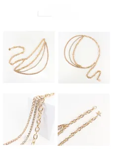Detail der mehrlagigen goldenen Metall-Taillenkette mit Strass und Sternanhänger