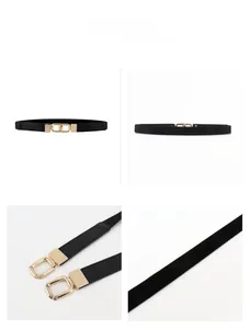 Detailed views of a slim black leather waist belt with elegant gold interlocking buckle