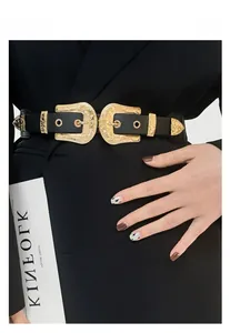 Detail van een brede zwarte lederen riem met florale gouden gespen in vintage stijl