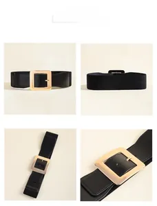Détails de la ceinture élastique noire avec grande boucle carrée dorée et cuir fini