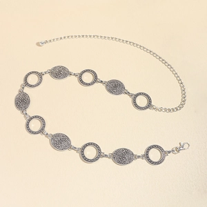 Vintage bohemian silver metal waist chain with hollow rings and engraved texture