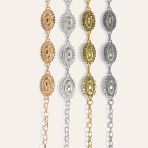 Detail view showing four metallic waist chains in gold, silver, rose gold and bronze colors