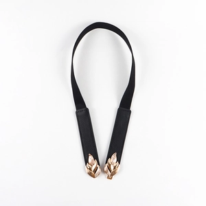 Elegant thin black elastic belt featuring a golden leaf-shaped metal buckle for women