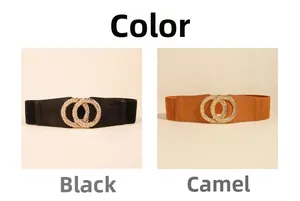 Detail of elegant elastic waist belts in black and camel colors with golden metal buckles