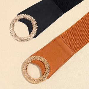 Elegant women's elastic belts in black and brown with golden round metal buckles