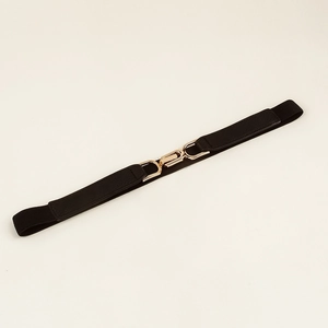 Detail of black elastic belt featuring golden interlocking metal buckle and faux leather ends