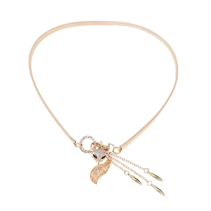 Elegant gold elastic metal waist belt featuring a rhinestone fox head and tassels