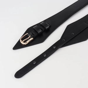 Elegant black leather waist belt with gold horseshoe buckle for shirts and jackets