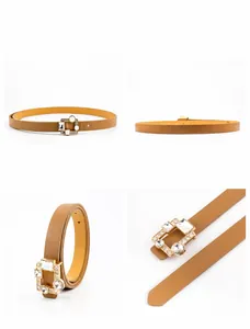 Close-up of thin brown leather belt featuring a rectangle buckle with sparkling crystals