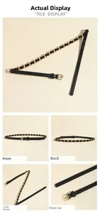 Détail de la fine ceinture en similicuir noir avec chaîne dorée tressée et boucle métal