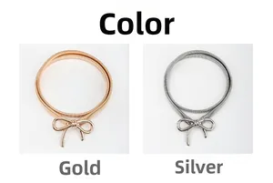Detailed close-up showing gold and silver bow buckle on elastic thin metal waist chains