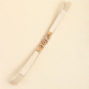 Detail of thin elastic waist belt featuring golden interlocking woven rings and beige leather