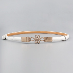Macro detail of white leather belt with a golden Chinese knot buckle for dresses