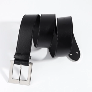 Close-up of black elastic waist belt with silver buckle and premium leather texture