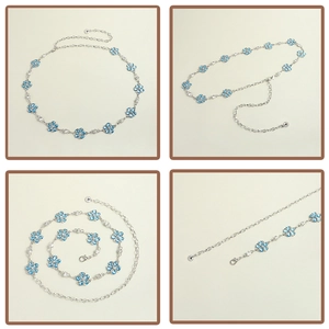 Detail of silver floral waist chain with blue crystal petals and adjustable lobster clasp
