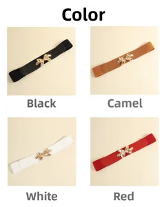 Elastic waist belts in black, camel, white, and red with golden mushroom buckle detail