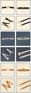 Détails macro de ceintures élastiques fines avec boucles métalliques dorées en trois couleurs