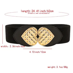 Elastic black waist belt for women featuring a large golden heart buckle with lattice pattern