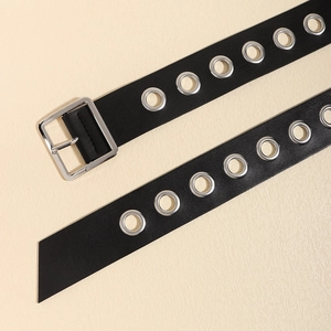 Punk black leather wide belt with silver metal eyelets and a square buckle for dresses