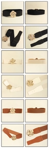 Three colors of wide elastic belts featuring large gold metal floral buckles on PU leather