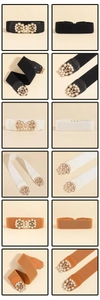 Detailed views of women's elastic wide waist belts with ornate pearl-studded gold buckles